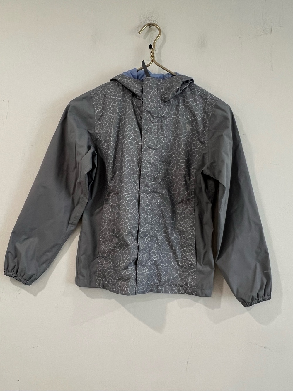 The  North Face Gray Hooded Rain Jacket with Subtle Pattern girl 10-12
